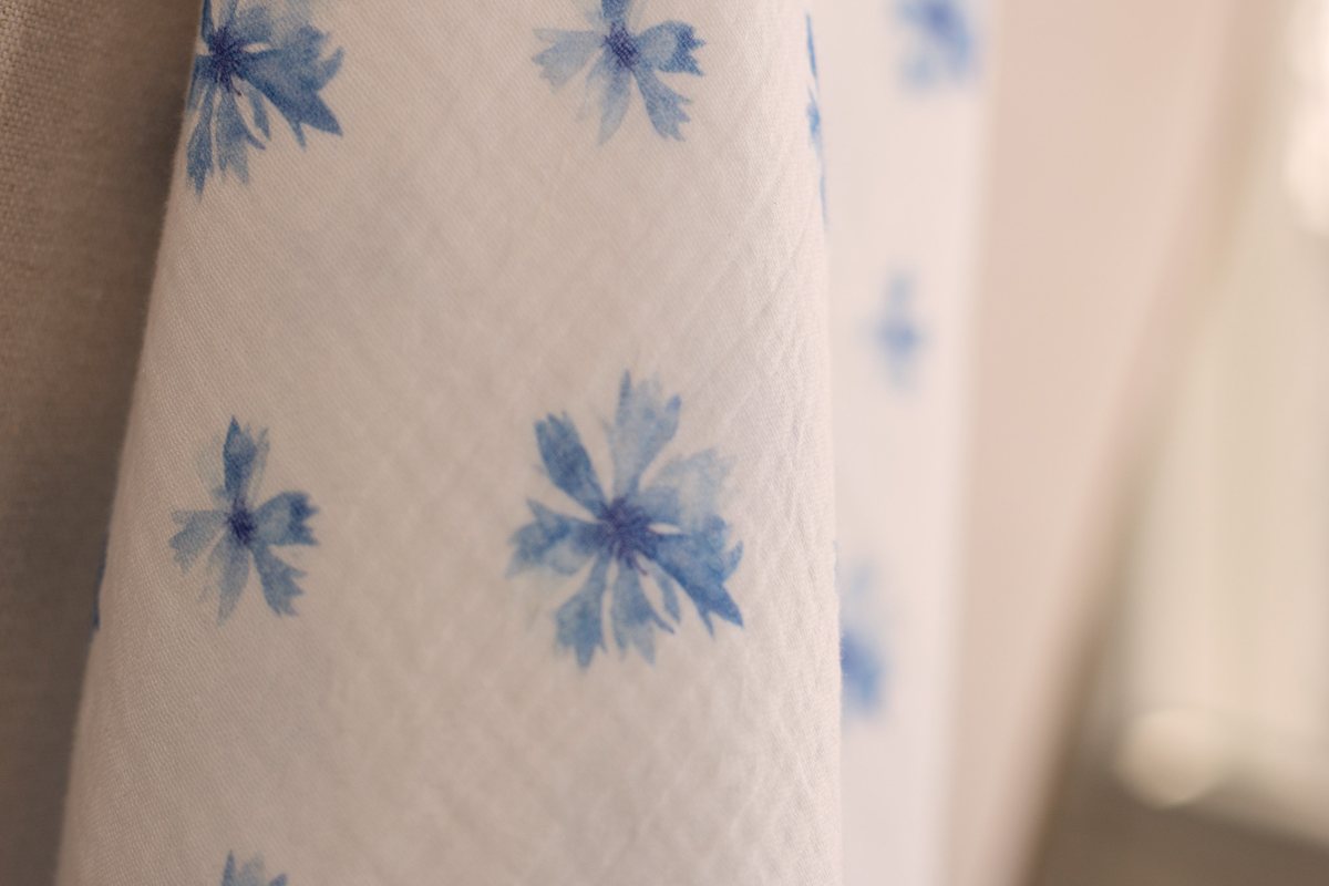 Cornflower muslin draped over a chair